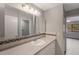 Bathroom with modern vanity, decorative backsplash, and large mirror at 424 Club Dr, Winter Springs, FL 32708