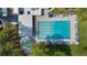Aerial shot showcasing a sparkling pool with plenty of lounge chairs for relaxing by the water at 424 Club Dr, Winter Springs, FL 32708