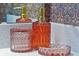 Close-up of bathroom decor, featuring decorative glass containers with intricate detailing at 4441 Ganesha Loop, Kissimmee, FL 34746
