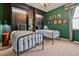 Charming bedroom featuring two twin beds, themed decor, and ambient lighting for a cozy and unique space at 4441 Ganesha Loop, Kissimmee, FL 34746
