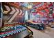 Fun themed bedroom with unique car bed and colorful wall decor at 4441 Ganesha Loop, Kissimmee, FL 34746