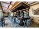 The bar area features stylish seating, a well-stocked bar, and decorative details, set against a backdrop of elegant design at 454 Captiva Dr, Davenport, FL 33896