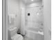 Bathroom with a tiled shower and bathtub at 454 Captiva Dr, Davenport, FL 33896