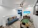 Bright game room boasts a foosball table, tv, and stylish furnishings, perfect for entertaining and relaxing at 454 Captiva Dr, Davenport, FL 33896