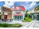 Charming ice cream parlor with red and white striped awning and outdoor seating at 454 Captiva Dr, Davenport, FL 33896