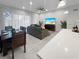 Open floor plan from dining area to living room and modern decor at 454 Captiva Dr, Davenport, FL 33896