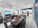 Open floor plan from dining area to living room and kitchen at 454 Captiva Dr, Davenport, FL 33896