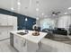 Open floor plan with a view from the kitchen to the living area at 454 Captiva Dr, Davenport, FL 33896