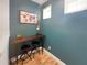 Small office space with desk and stool at 454 Captiva Dr, Davenport, FL 33896