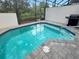 Private swimming pool surrounded by beautiful brick pavers at 454 Captiva Dr, Davenport, FL 33896