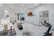 Spacious open-concept living room with tile flooring and contemporary decor at 503 Meadow Pointe Dr, Haines City, FL 33844