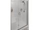 Bathroom featuring a shower with clear glass doors and a shower head at 503 Meadow Pointe Dr, Haines City, FL 33844