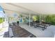 Covered picnic area with multiple tables and a mural for community gatherings and relaxation at 5515 Windsong Oak Dr, Leesburg, FL 34748