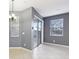 Cozy dining area featuring tile floors, neutral colors, a chandelier and a sliding glass door to the backyard at 585 Cruz Bay Cir, Winter Springs, FL 32708