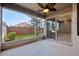 Spacious, covered lanai featuring a ceiling fan and backyard views at 585 Cruz Bay Cir, Winter Springs, FL 32708