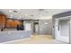 Open-concept living space with eat-in counter and lots of natural light at 585 Cruz Bay Cir, Winter Springs, FL 32708