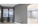 Bright living room with tile flooring and large windows at 585 Cruz Bay Cir, Winter Springs, FL 32708