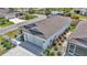 Exterior aerial view showing a well-maintained landscape, private entrance, and attached garage at 6223 Atkinson Ln, The Villages, FL 32163