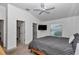 Main bedroom with a walk-in closet and an ensuite bathroom at 6223 Atkinson Ln, The Villages, FL 32163
