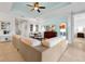 Spacious living area features tile flooring, a cozy seating area, and modern decor at 634 Via Corso Ct, Kissimmee, FL 34759