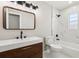 Bathroom boasts modern vanity with double sink and luxurious shower/tub combination at 641 Peachwood Dr, Altamonte Springs, FL 32714