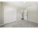 Bedroom featuring gray carpet, neutral walls, and a closet for storage at 641 Peachwood Dr, Altamonte Springs, FL 32714