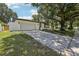 Charming one-story home with a two car garage, mature landscaping, and inviting curb appeal at 641 Peachwood Dr, Altamonte Springs, FL 32714