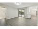 Open living area featuring access to the backyard, complemented by a modern, eat-in kitchen at 641 Peachwood Dr, Altamonte Springs, FL 32714