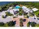 Community clubhouse with pool, tennis courts, and playground at 733 Longboat Dr, Davenport, FL 33896