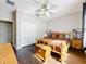 Bedroom showcasing a rustic bed, hardwood floors, and closet at 9942 Sweetleaf St, Orlando, FL 32827