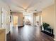 Spacious living room with hardwood floors, neutral paint, and plenty of natural light at 9942 Sweetleaf St, Orlando, FL 32827