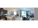 Open-concept living area with a modern kitchen, dining area, and cozy living space at 15708 Orange Harvest Loop, Winter Garden, FL 34787