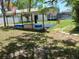 Backyard featuring a covered patio, pool and stepping stones at 1100 Peak Cir, Deltona, FL 32738