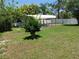 Spacious backyard with a covered patio and basketball hoop at 1100 Peak Cir, Deltona, FL 32738