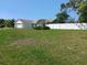 Well-maintained house with a big manicured front lawn at 1100 Peak Cir, Deltona, FL 32738