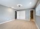 Bedroom features wood flooring, closet with white doors and ensuite bathroom at 116 7Th St, Winter Haven, FL 33880
