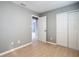 Bedroom features neutral walls and double closet at 116 7Th St, Winter Haven, FL 33880