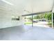 View of the carport featuring a painted floor and view of the street at 116 7Th St, Winter Haven, FL 33880