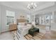 Spacious main bedroom with tray ceiling and outdoor access at 1266 Saint Albans Loop, Lake Mary, FL 32746
