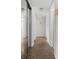 Hallway with closet, showing access to rooms, clean design, and modern lighting for ease of navigation at 1340 Continental Dr, Daytona Beach, FL 32117