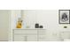 Bright bathroom with white vanity, drawers and mirror at 1365 Inkberry Cir, Deland, FL 32720