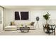 Stylish living room with comfortable seating, modern artwork, and a cozy, inviting atmosphere at 1365 Inkberry Cir, Deland, FL 32720