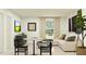Bright living room features a couch and modern decor at 1365 Inkberry Cir, Deland, FL 32720