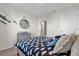 Comfortable bedroom with a decorative mirror and nautical themed decor at 1555 Dawnview Way, Kissimmee, FL 34744