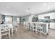 Bright living space with open kitchen and dining area, ideal for entertaining and Gathering gatherings at 1555 Dawnview Way, Kissimmee, FL 34744