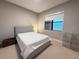 Cozy bedroom with a window view at 16300 County Road 455 # 703, Montverde, FL 34756