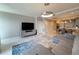 Open concept living area with water view and neutral decor at 16300 County Road 455 # 703, Montverde, FL 34756