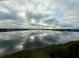 Beautiful water view with the clouds reflecting on the water at 16300 County Road 455 # 703, Montverde, FL 34756