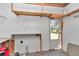 Interior view of shed with counter, shelves, and exterior door at 16758 Ne 135Th Ave, Fort Mc Coy, FL 32134