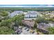 Aerial view of multi-Gathering community, showcasing mature trees and ample parking at 1806 Foxhall Cir # 1806, Kissimmee, FL 34741